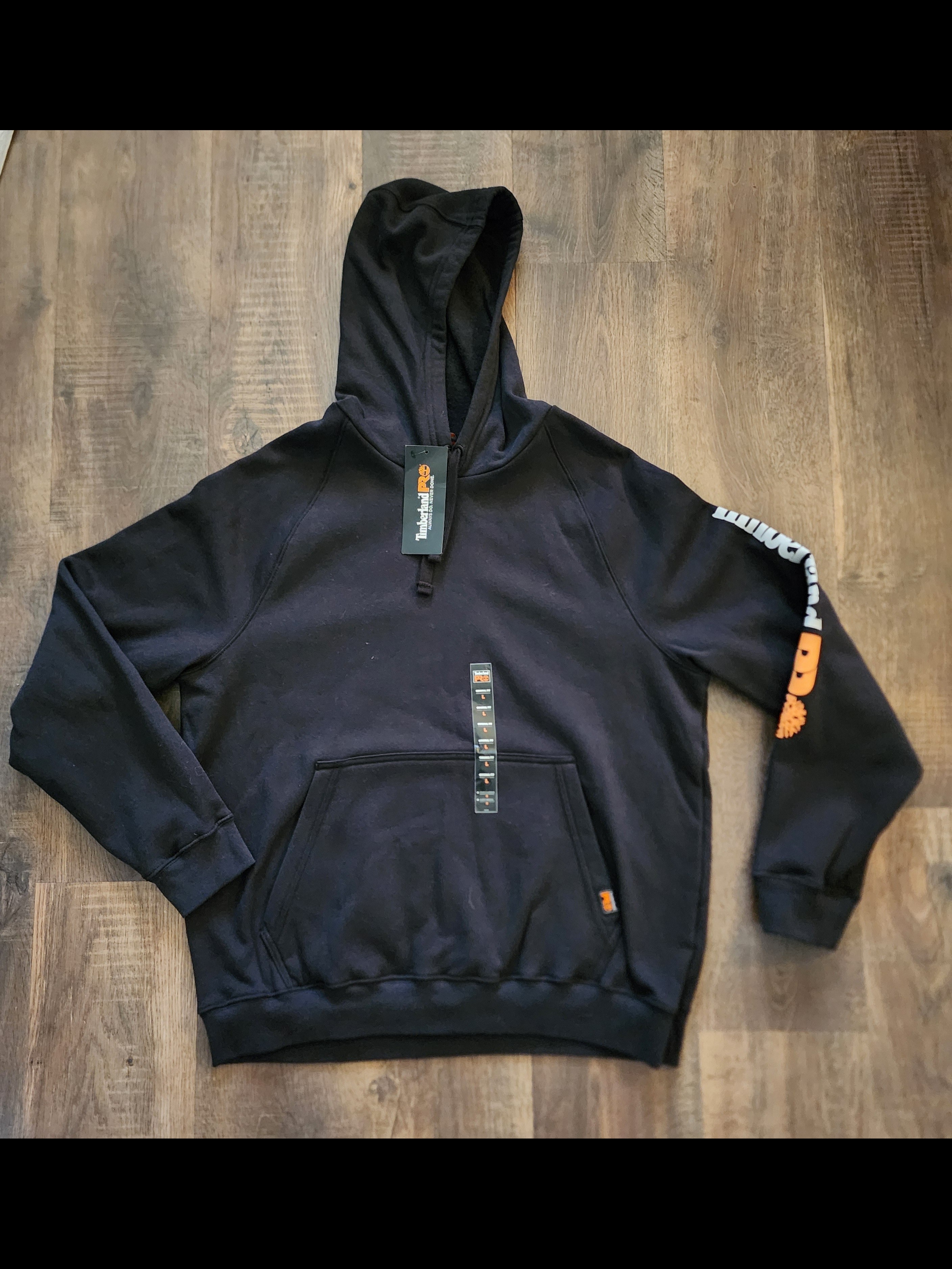 Timberland Black Hoodie With Orange Logo On Sleeve